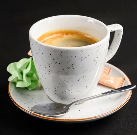 Coffee espresso over black background. Coffeee time, isolated on black.